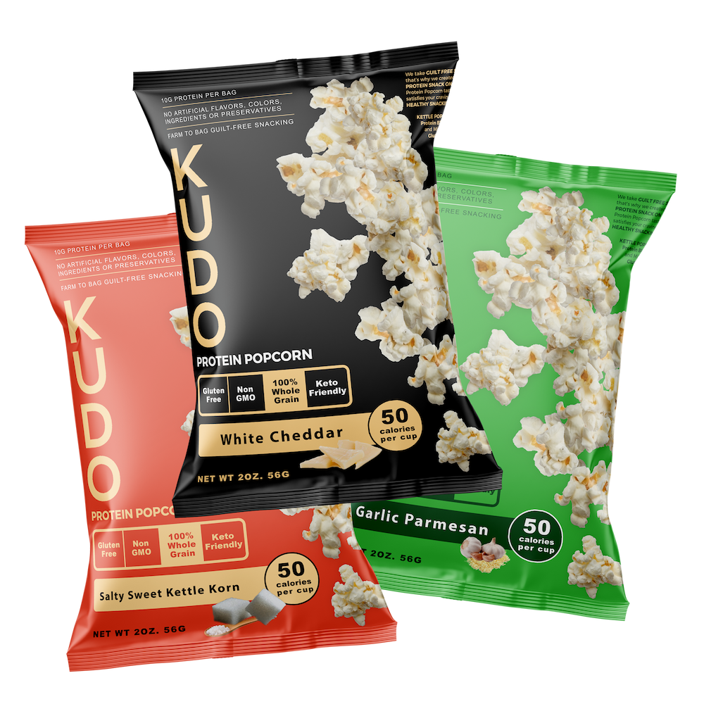 All Things COOKING, FOOD & WINE showing three different flavors of protin popcorn in red, black, and green bags